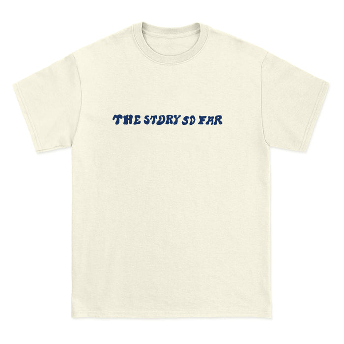 A Comfort Colors off-white tee from The Story So Far, featuring the band name in bold wavy blue letters across the chest—a must-have for fans of branded merchandise.