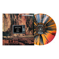 Orange & Oxblood splatter vinyl LP by The Bar Stool Preachers sits beside its album cover—cliffs, burning trees, and a vintage TV showing the title "Below the Static." Now available for presale.
