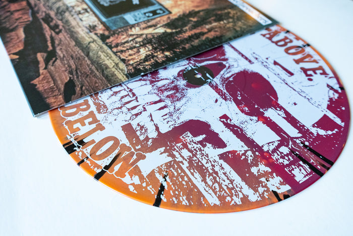 A vinyl LP by The Bar Stool Preachers is partially pulled from its bold red-orange abstract cover, labeled “ABOVE” and “BELOW,” and features an exclusive Orange & Oxblood splatter. Secure your copy now during the presale!.