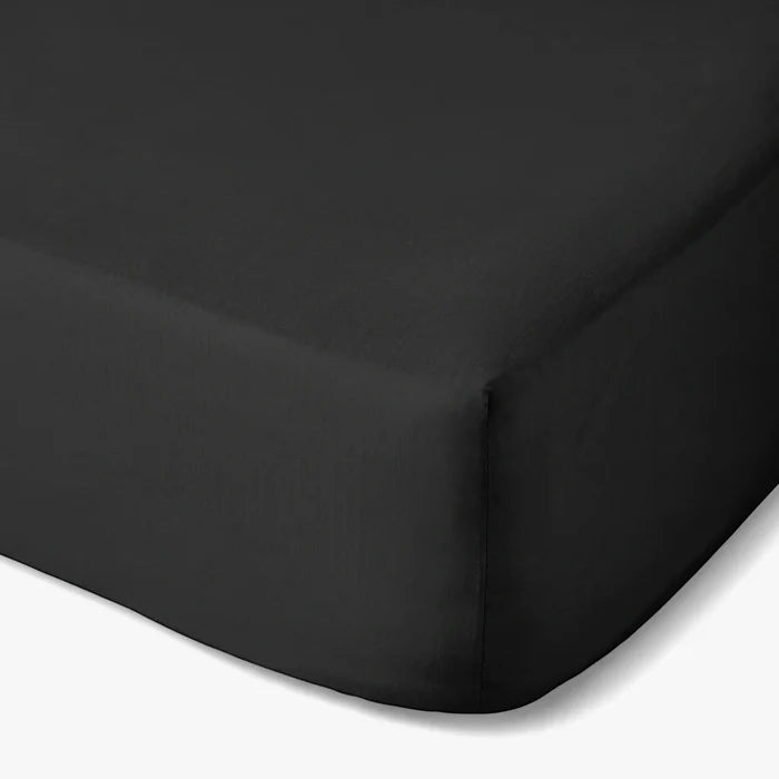 A black Cotton Co 400 thread queen extra fitted sheet is displayed from a slightly elevated angle.