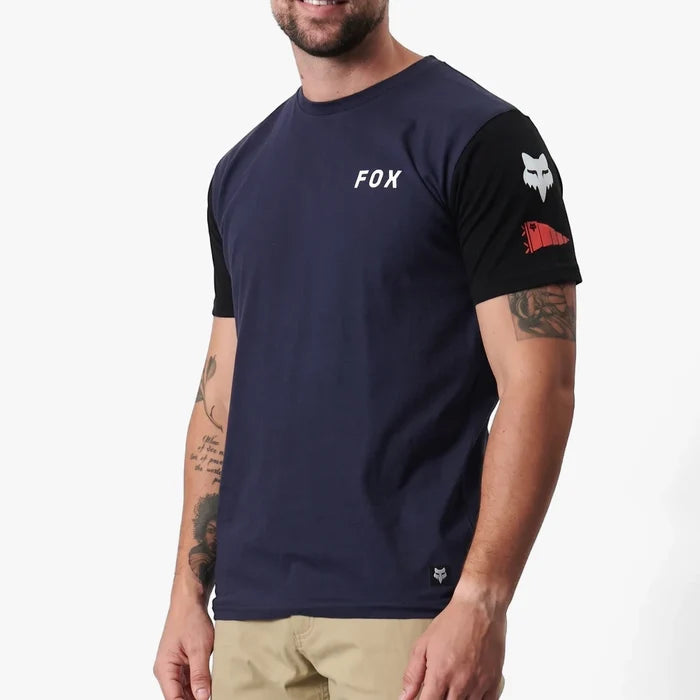 Fox Mens Rs Short Sleeve Tee in navy and black, featuring white Fox logos on the chest and sleeve, worn by a man with
