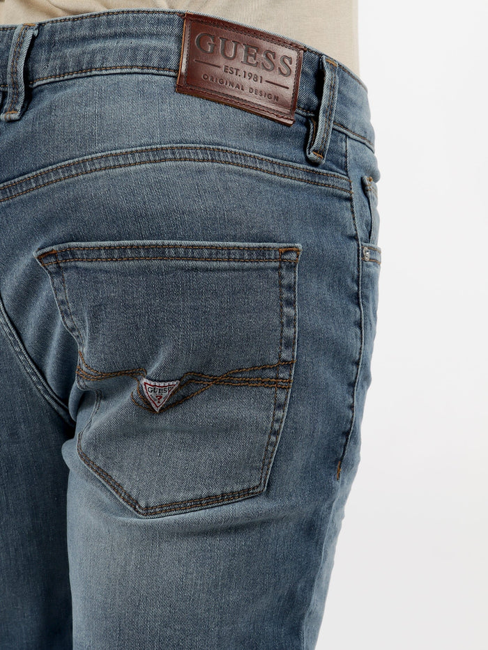 Guess Mens Logan Skinny Jeans Light Wash | Guess