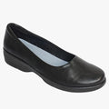 Black leather Hush Puppies Ladies Soft Jasmine slip-on shoe with a low wedge heel, displayed from a slight high-angle view.
