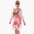 Lizzy Womens Kendyl Overswim in Spiced Coral, featuring a pink and white tie-dye pattern and flowing silhouette, worn by a