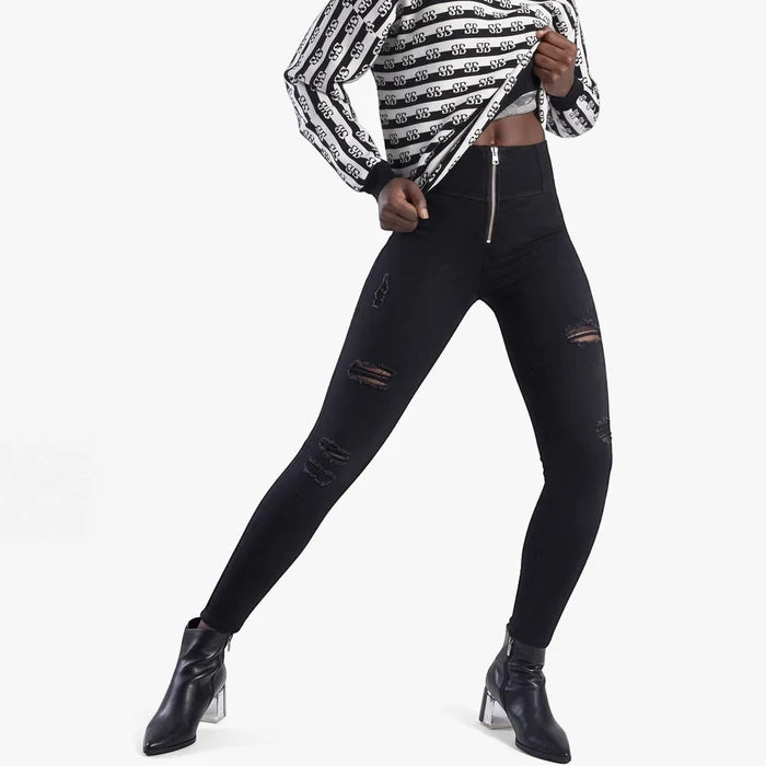 Sissy Boy Womens Omega:Ryder knit and jean combo with rips. Black high-waisted ripped jeans and a black and white striped