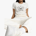 Puma Wopmens Graphics Grow And Flourish Tee Alpine Snow | Puma